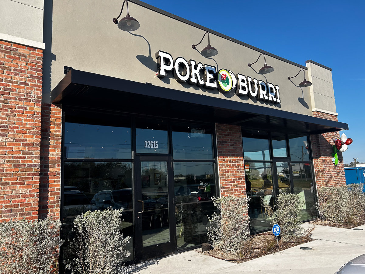 side angle of building with poke burri sign